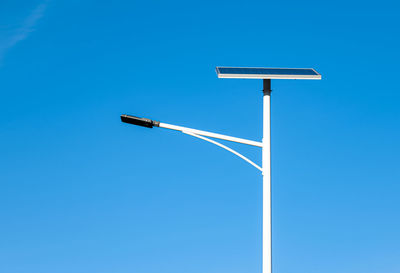 Street pole with photovoltaic panel