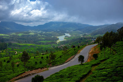 Scenic view of landscape and mountains against sky