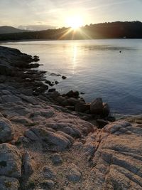 Scenic view of sea against sky during sunset