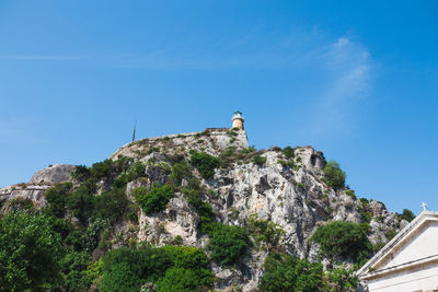 Low angle view of building against mountain