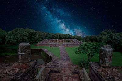 Built structure against sky at night in sanchi heritage complex