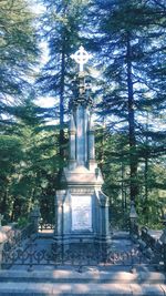 View of buddha statue against trees