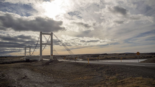 View of bridge over road against sky