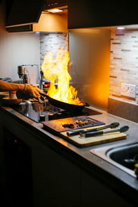 Fire in the pan cooking meat