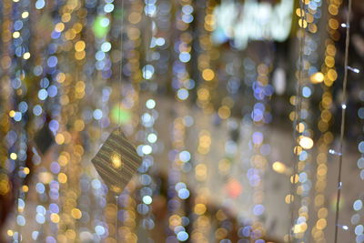 Defocused image of illuminated lights at night