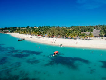 Scenic view of sea against blue sky. kendwa. zanzibar