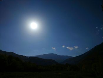 Scenic view of silhouette mountains against sky