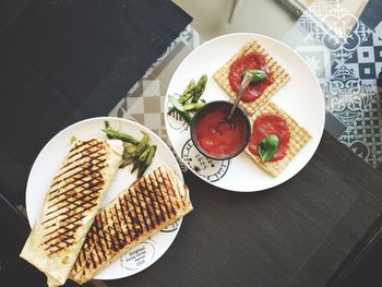 High angle view of breakfast served on table