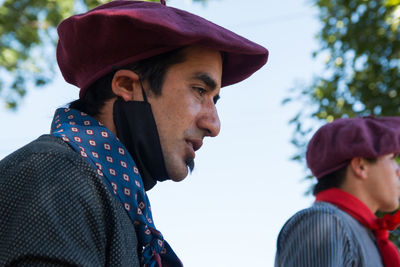 Argentinian traditional people wearing face mask