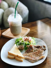 Close-up of breakfast served on table