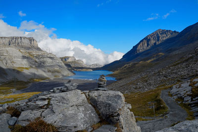 Panoramic view of rocks and mountains against sky