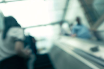 Defocused image of people on road