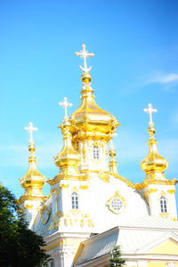 Low angle view of building against blue sky