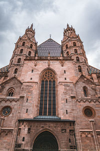 Low angle view of historic building against sky