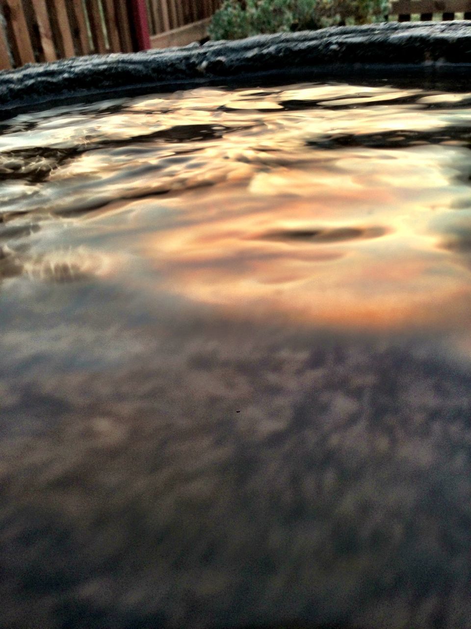 water, waterfront, sunset, rippled, reflection, surface level, tranquility, nature, no people, outdoors, backgrounds, beauty in nature, full frame, scenics, high angle view, tranquil scene, orange color, idyllic, wet, day