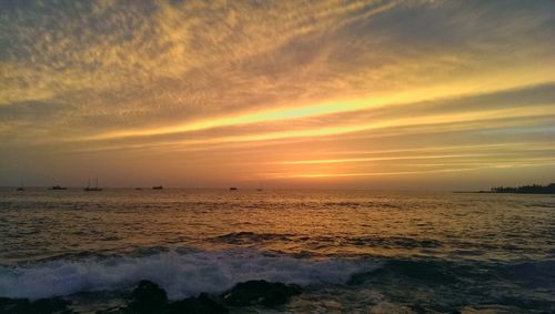 Scenic view of sea against sky during sunset