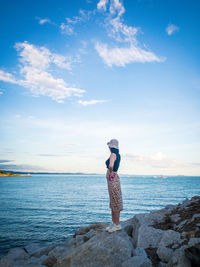 Man looking at sea against sky