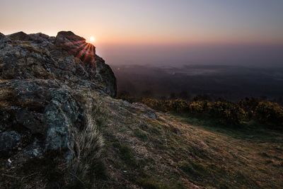 Scenic view of mountains against sky during sunset