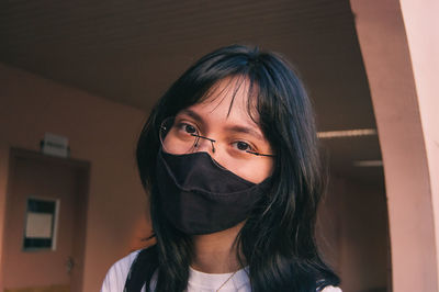 Portrait of asian woman wearing mask