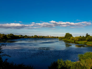 View of lake against cloudy sky