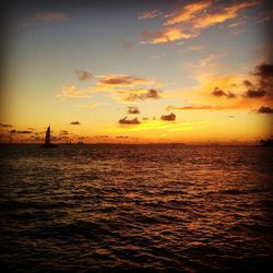 Scenic view of sea at sunset