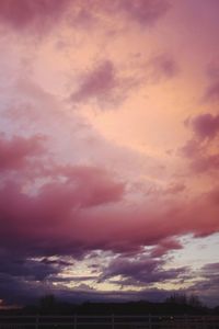 Scenic view of dramatic sky during sunset