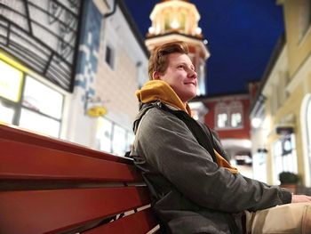 Side view of young man looking away