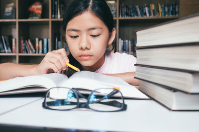 Girl studying at table