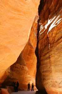 People on rock formation