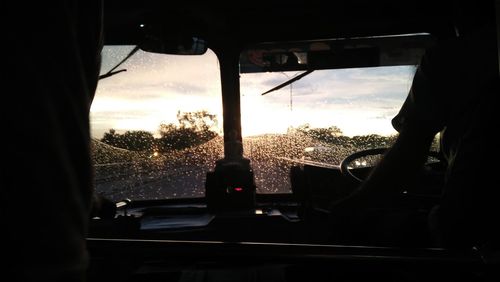 Reflection of sky seen through car window