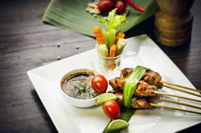 Close-up of served food on table