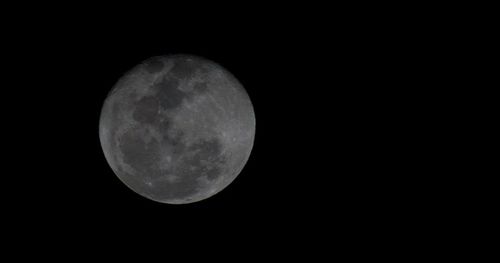 Low angle view of moon in sky