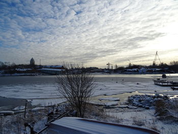 View of bridge over river during winter