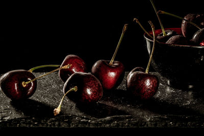 Close-up of strawberry over black background