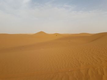 Scenic view of desert against sky