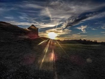 Sun shining through clouds