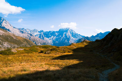 Scenic view of snowcapped mountains against sky