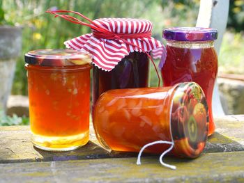 View of juices in glass jars with lids