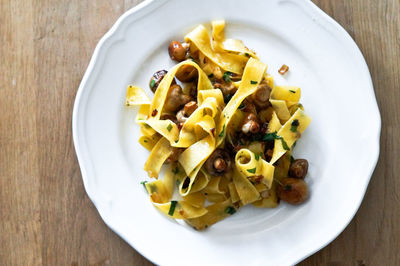 High angle view of pasta in plate on table