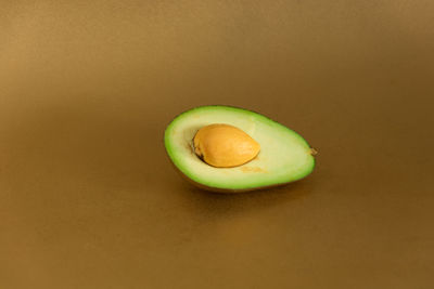 Close-up of fruit against white background