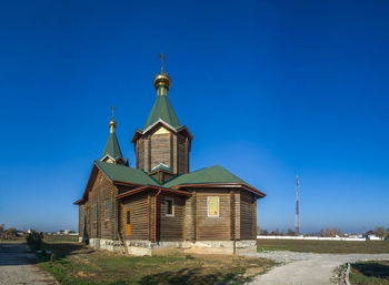 Traditional building against clear blue sky