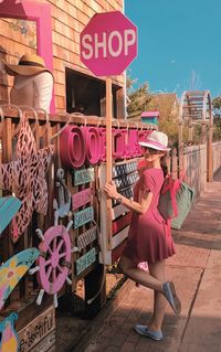 Woman standing at market stall