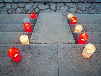 High angle view of illuminated lights on footpath