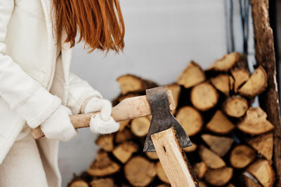 Midsection of woman working at workshop