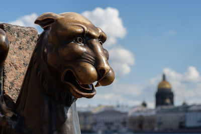 Close-up of statue against sky