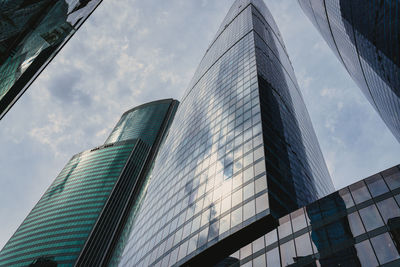 Low angle view of modern buildings against sky