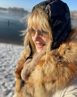 Portrait of woman in snow