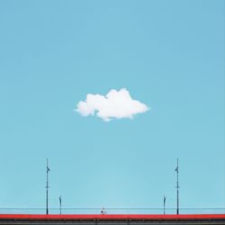 Low angle view of road against blue sky