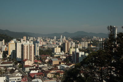 View of cityscape against clear sky