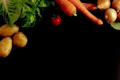 High angle view of oranges on black background
